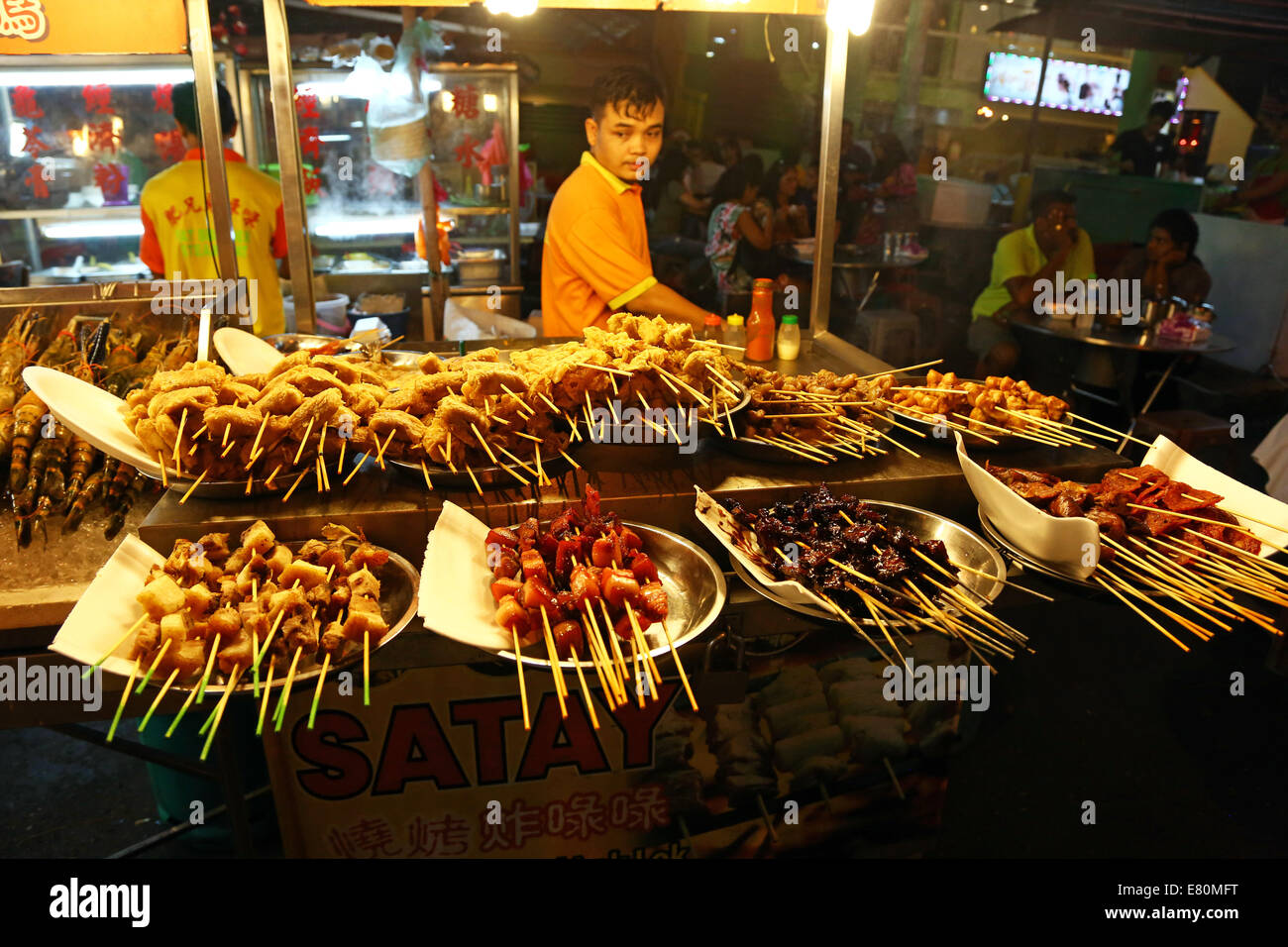 Satay stall with street food in Jalan Alor in Bukit Bintang in Kuala Lumpur, Malaysia Stock Photo
