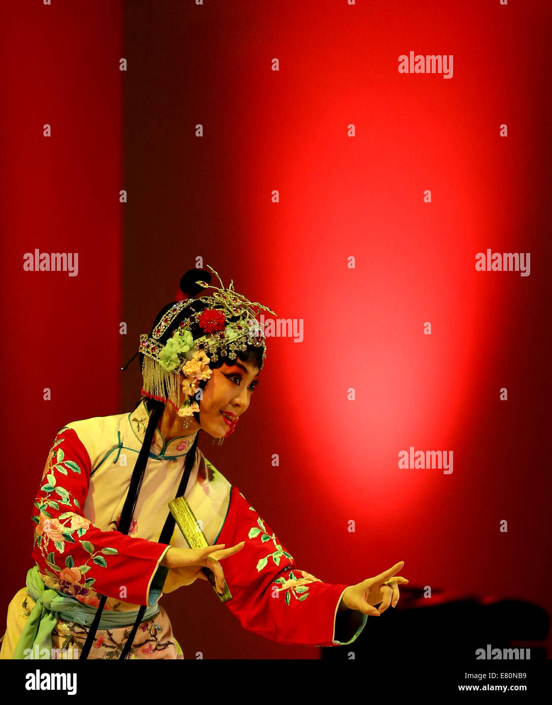 London, Britian, UK. 27th Sep, 2014. A Chinese traditional art performance is staged in a ceremony to mark the 10th anniversary of Confucius Institute and the first global Confucius Institutes Day, at the Cadogan Hall, southwest of London, Britian, on Sept. 27, 2014. Credit:  Han Yan/Xinhua/Alamy Live News Stock Photo