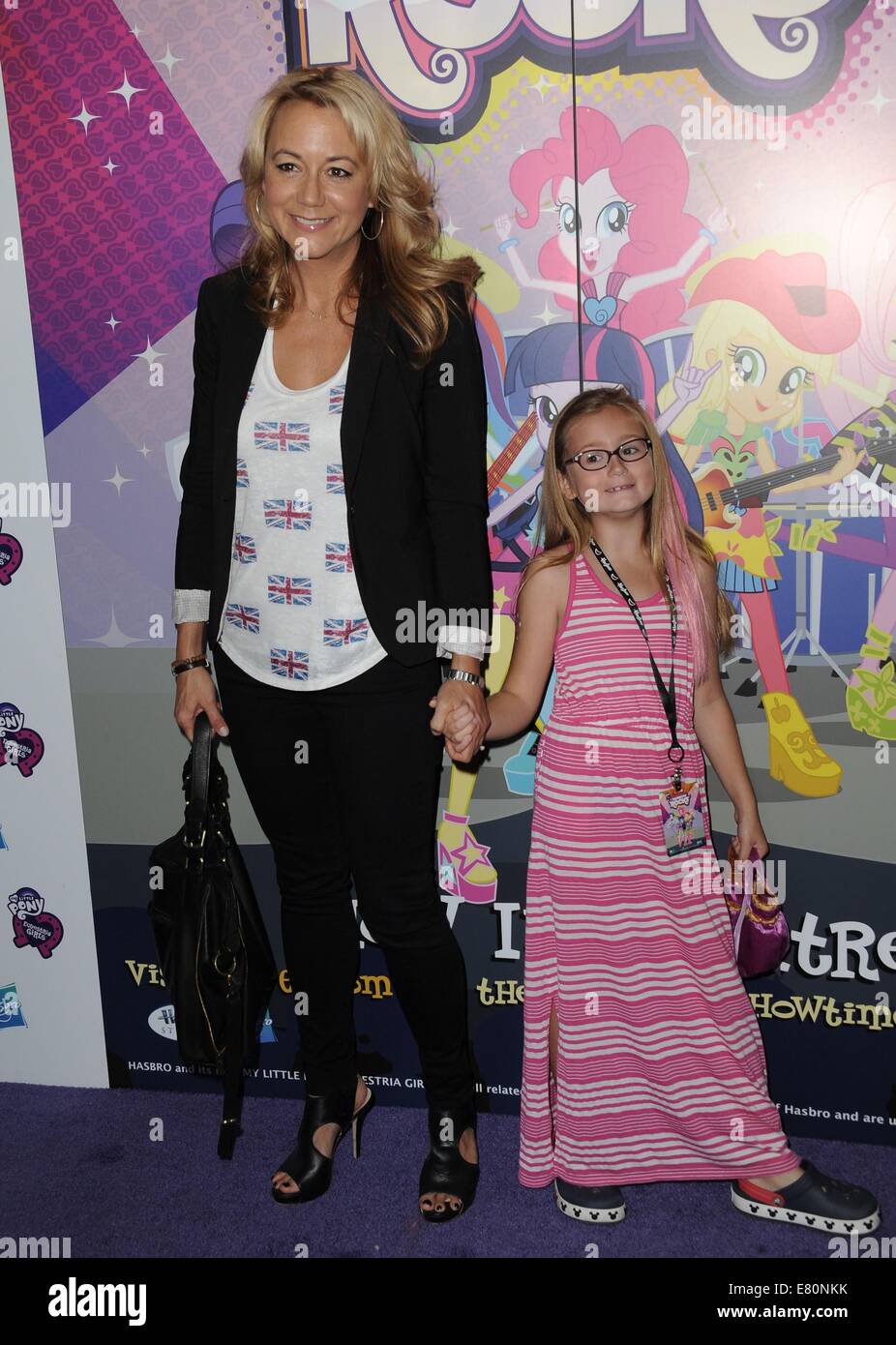 Los Angeles, CA, USA. 27th Sep, 2014. Megyn Price, Daughter at arrivals for My Little Pony Equestria Girls Premiere Premiere, TCL Chinese 6 Theatres (formerly Grauman's), Los Angeles, CA September 27, 2014. Credit:  Dee Cercone/Everett Collection/Alamy Live News Stock Photo