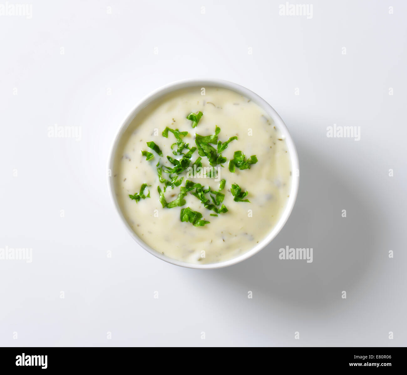 Bowl of mayonnaise dressing with parsley Stock Photo Alamy