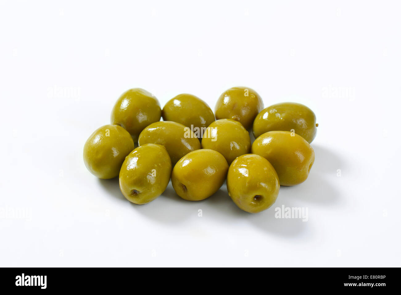 Unpitted brine cured green olives Stock Photo Alamy