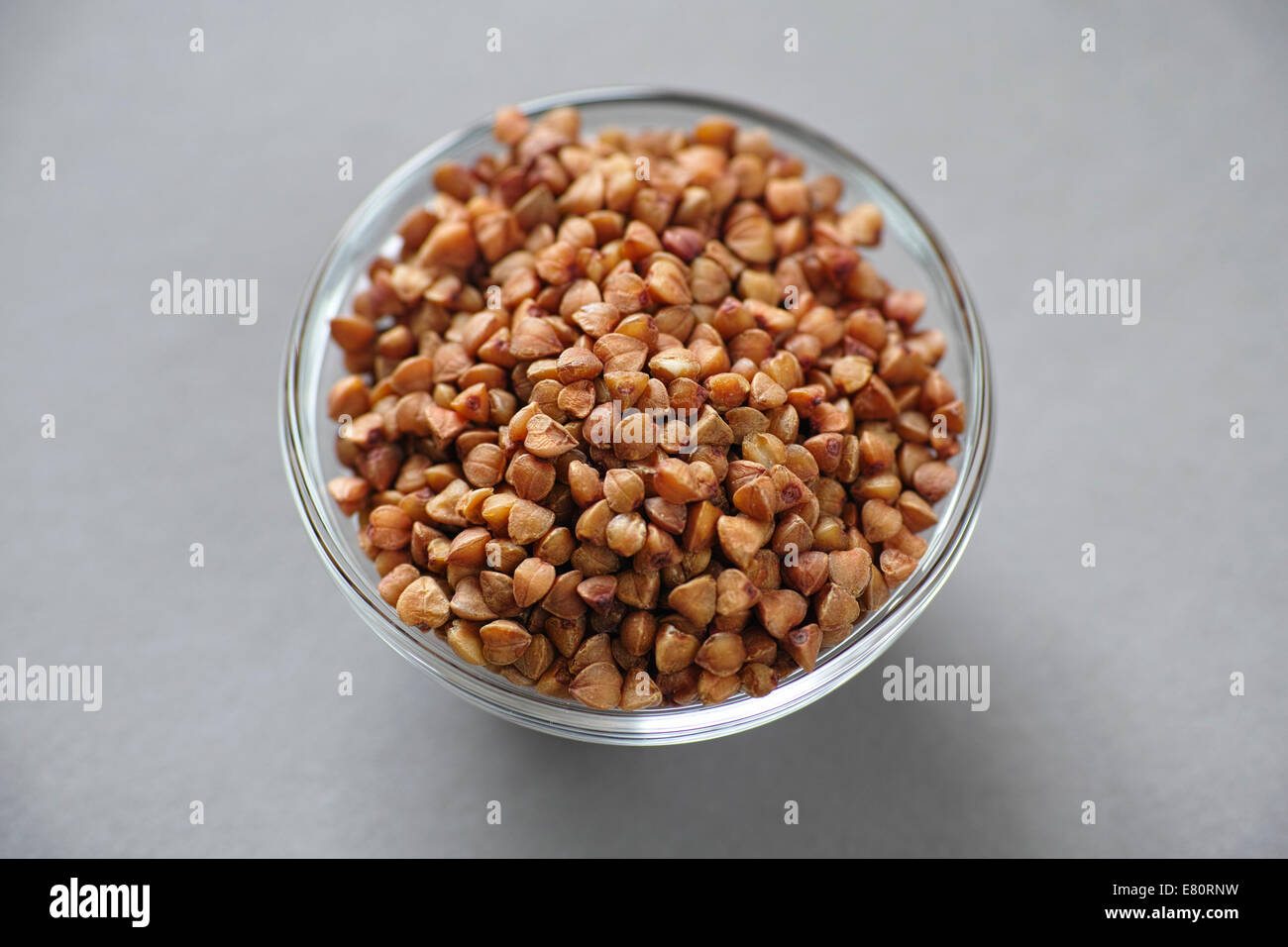 Buckwheat in a glass bowl. Super sharpness image. Medium format image quality. Stock Photo