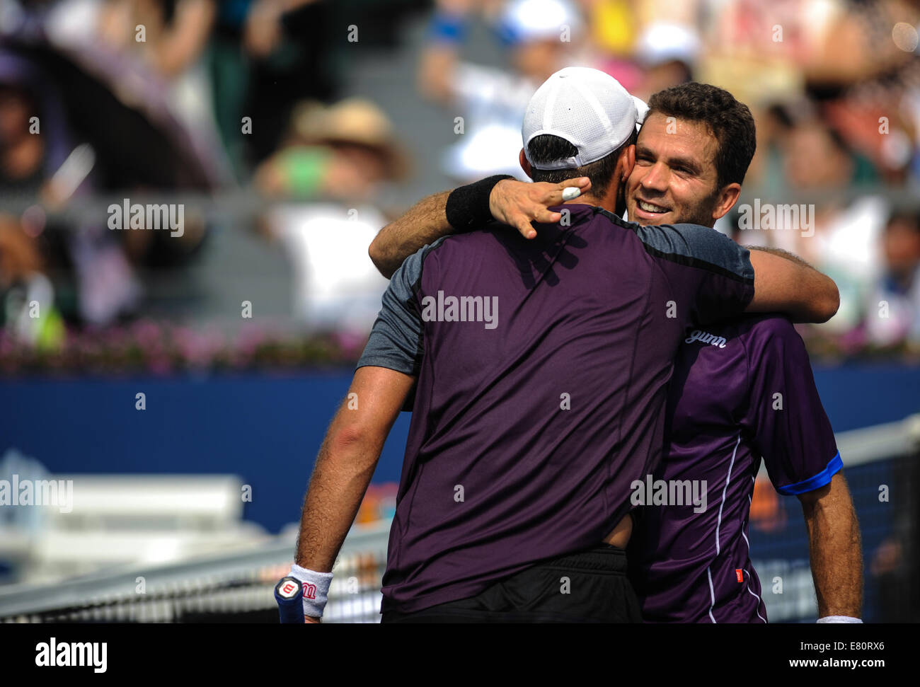 Shenzhen, China's Guangdong Province. 28th Sep, 2014. Jean-Julien Rojer of Netherlands (R) and Horia Tecau of Romania celebrate after the men's doubles final match against Sam Groth and Chris Guccione of Australia at the ATP Shenzhen Open tennis tournament in Shenzhen, south China's Guangdong Province, on Sept. 28, 2014. Jean-Julien Rojer and Horia Tecau won 2-0 and claimed the title. Credit:  Mao Siqian/Xinhua/Alamy Live News Stock Photo
