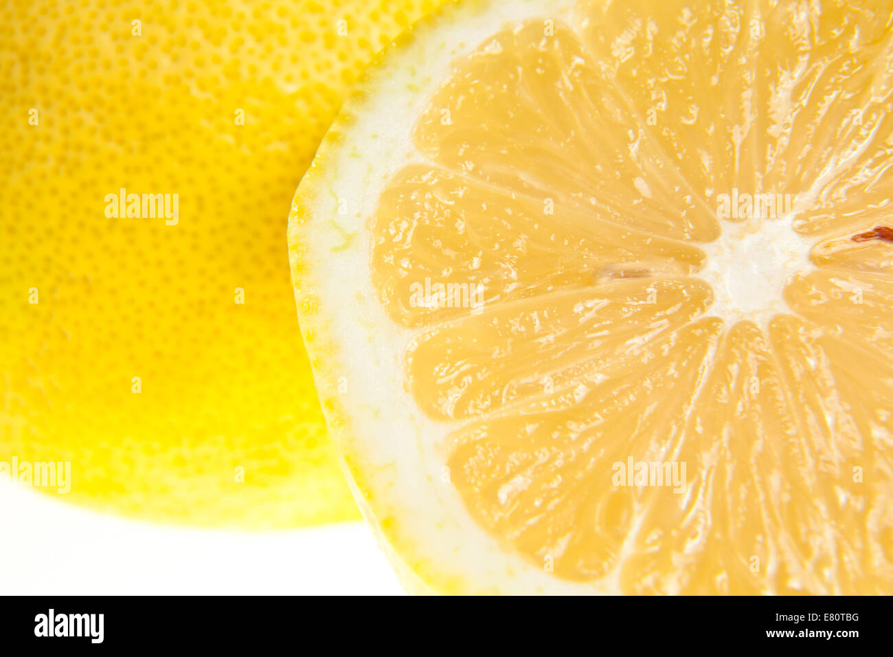 Lemon (Citrus x limon) - isolated ripe fruit against white background ...
