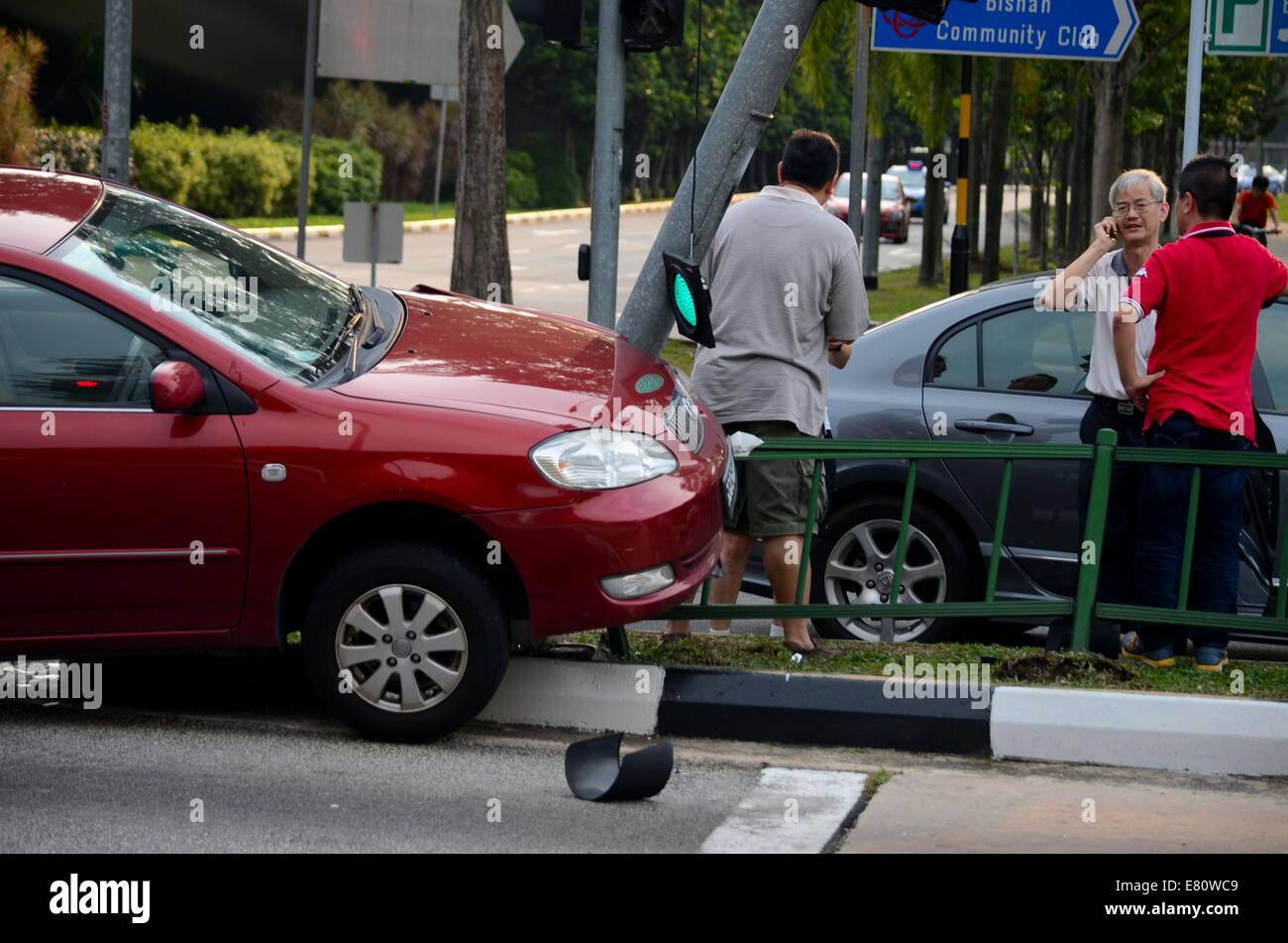 Motor vehicle car accident on pavement in Bishan Singapore Stock Photo