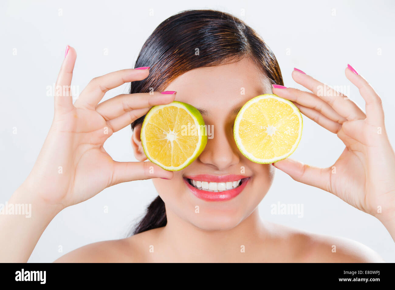 indian Beautiful Ladie Hiding Face  Orange Stock Photo