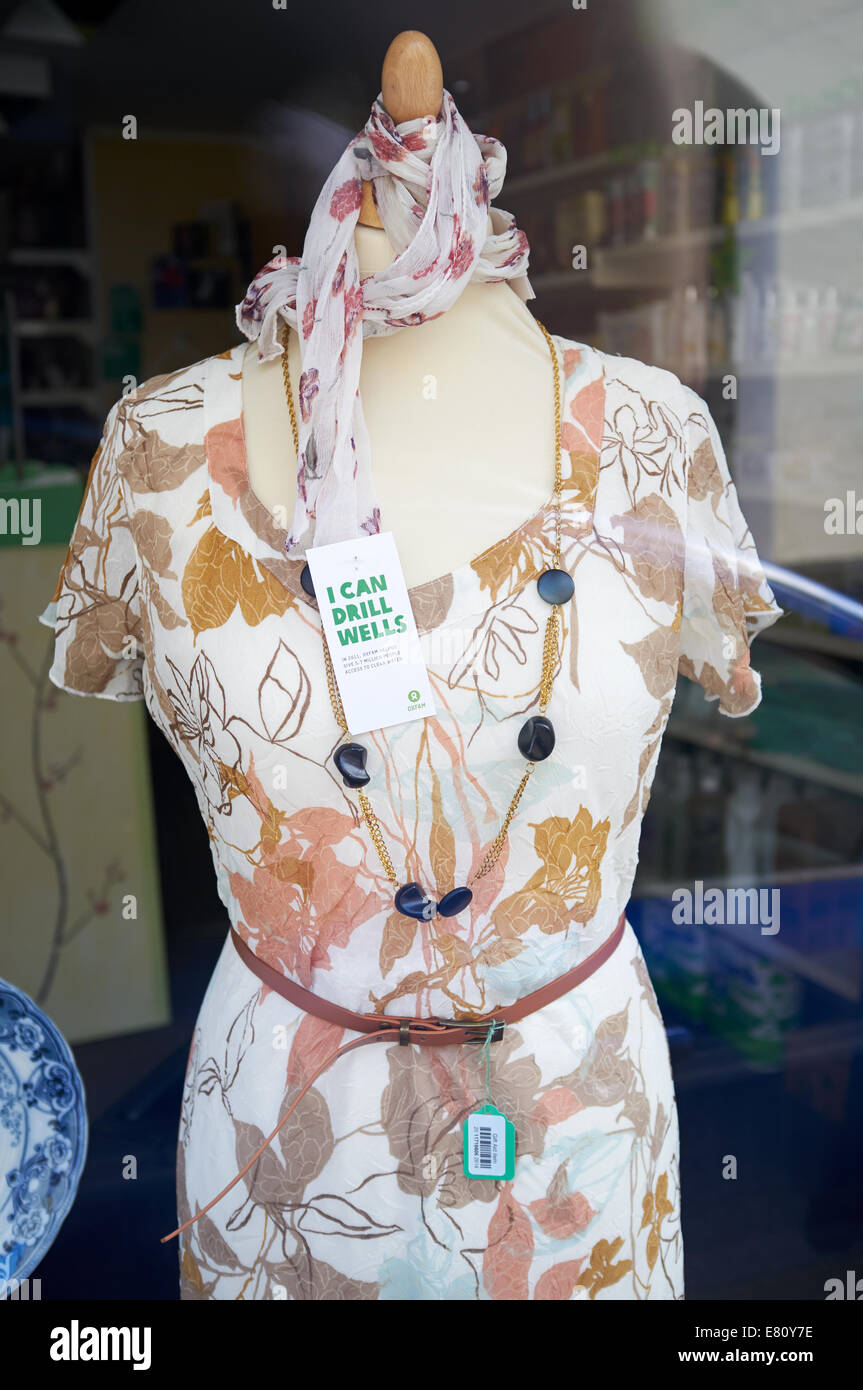 Oxfam charity shop window display Stock Photo - Alamy
