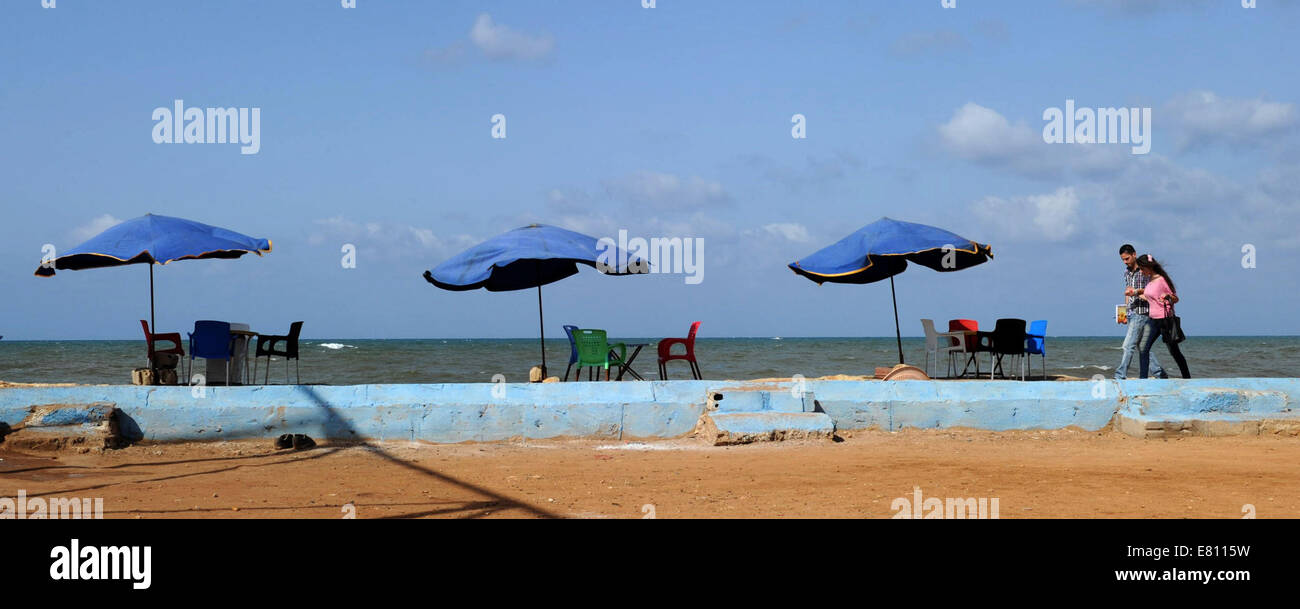 Tartous Port, Syria. 27th Sep, 2014. People take a walk in Tartous port, central Syria, Sept. 27, 2014. Credit:  Zhang Naijie/Xinhua/Alamy Live News Stock Photo