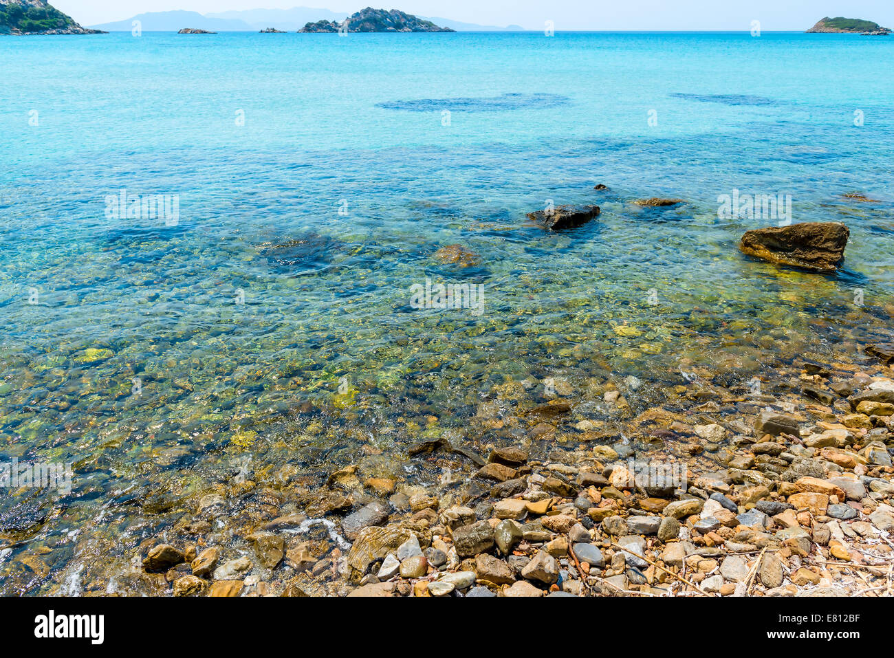 clear sea water and rocky bottom Stock Photo - Alamy