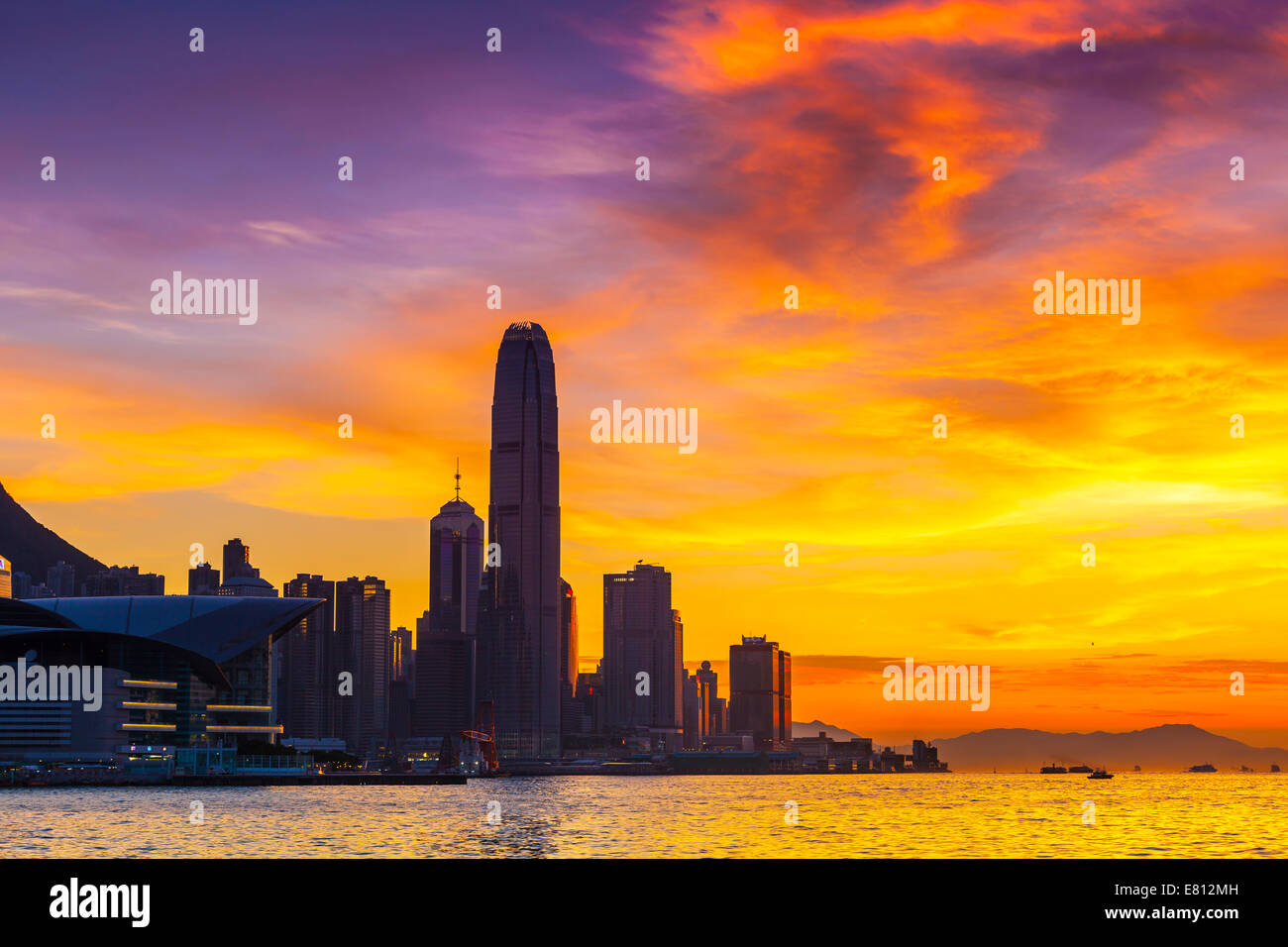 Hong Kong harbor sunset Stock Photo - Alamy