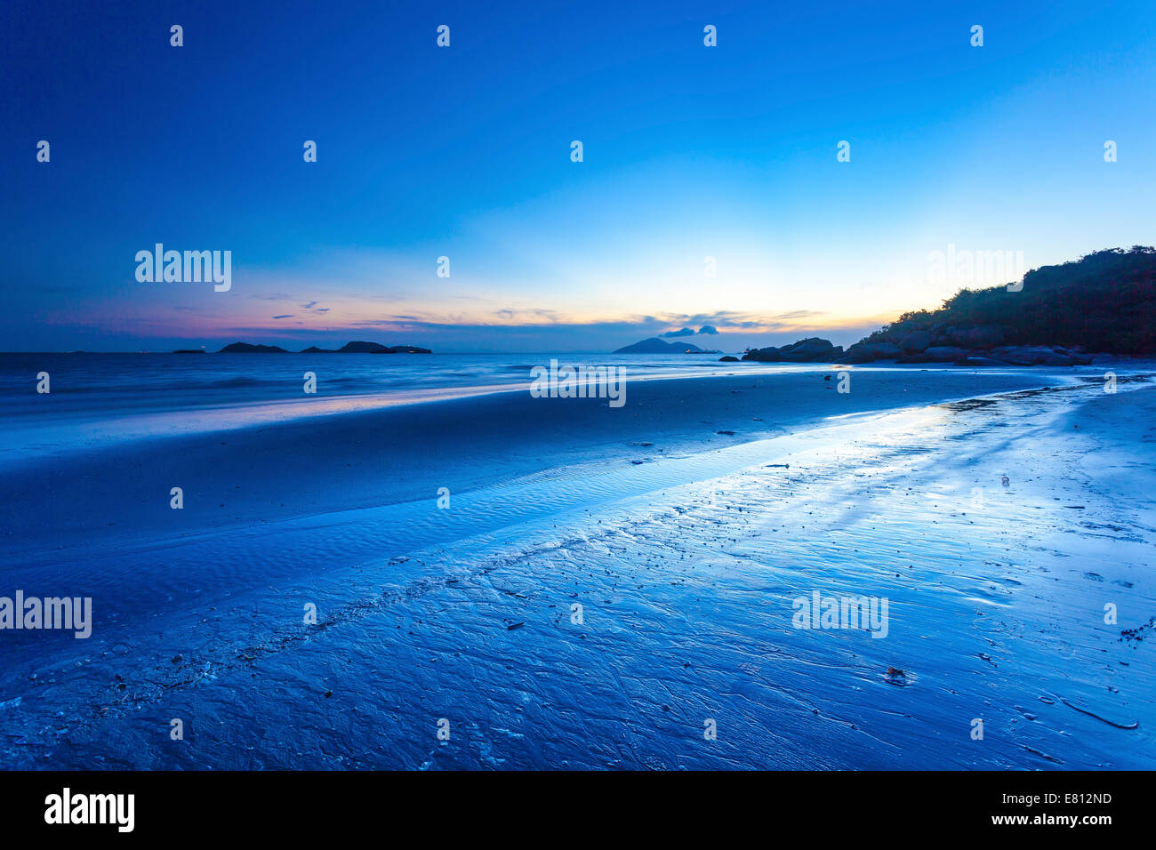 Sunset at beach in Hong Kong Stock Photo - Alamy