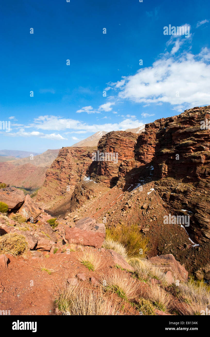 Vertical view of the red sandstones cliffs in the High Atlas Mountain range in Morocco. Stock Photo