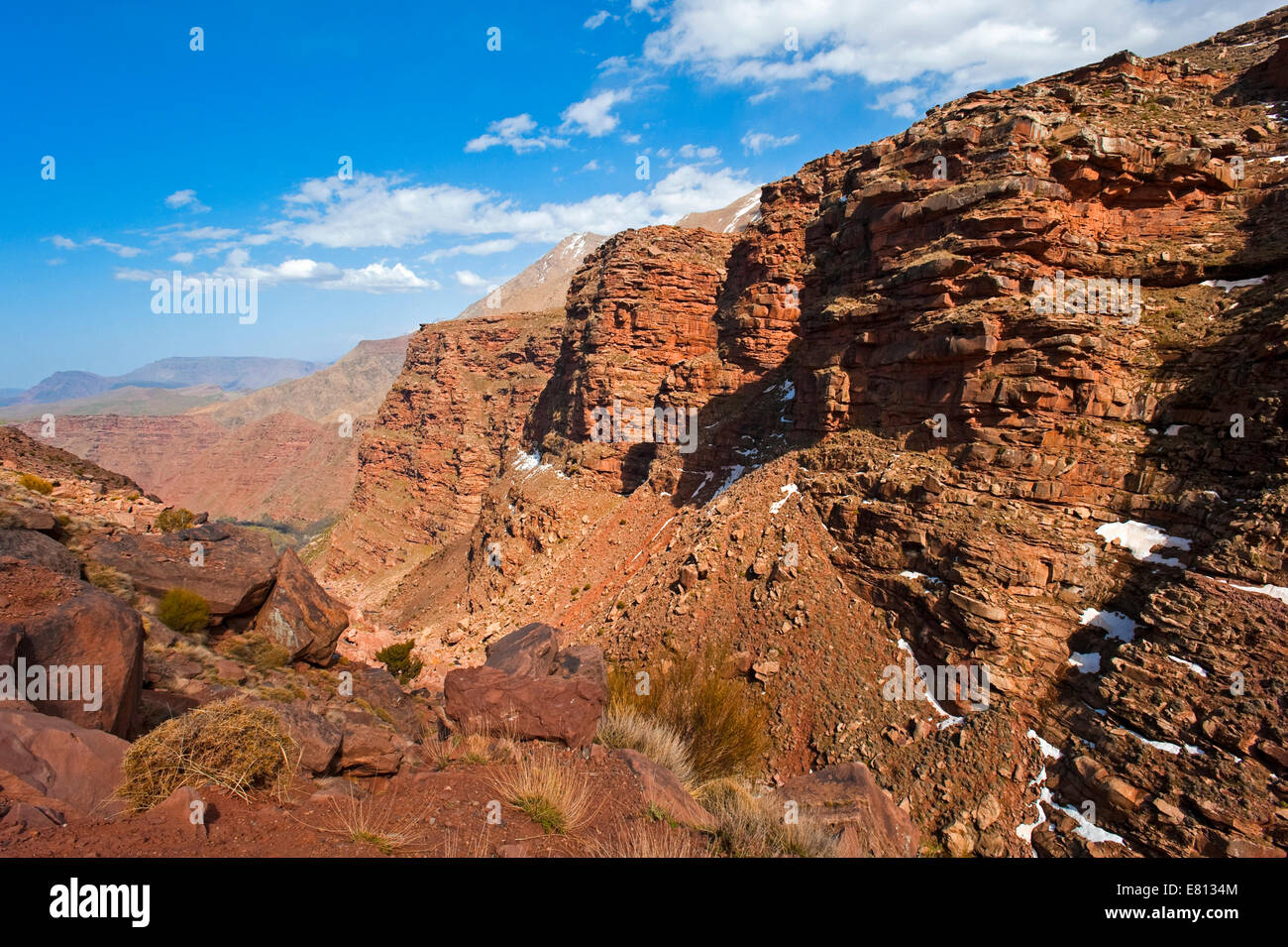 Horizontal view of the red sandstones cliffs in the High Atlas Mountain range in Morocco. Stock Photo