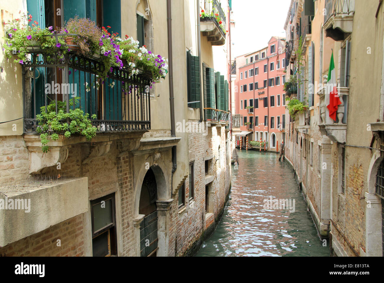 Canal in Venice. Urban landscape with houses, boats and water. Italy. Stock Photo