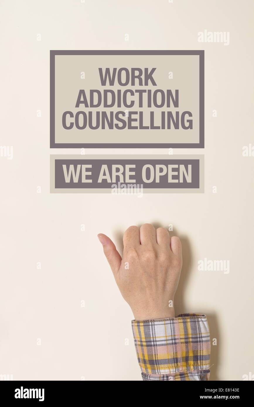 Female Hand is knocking on Work Addiction Counselling door, conceptual image Stock Photo