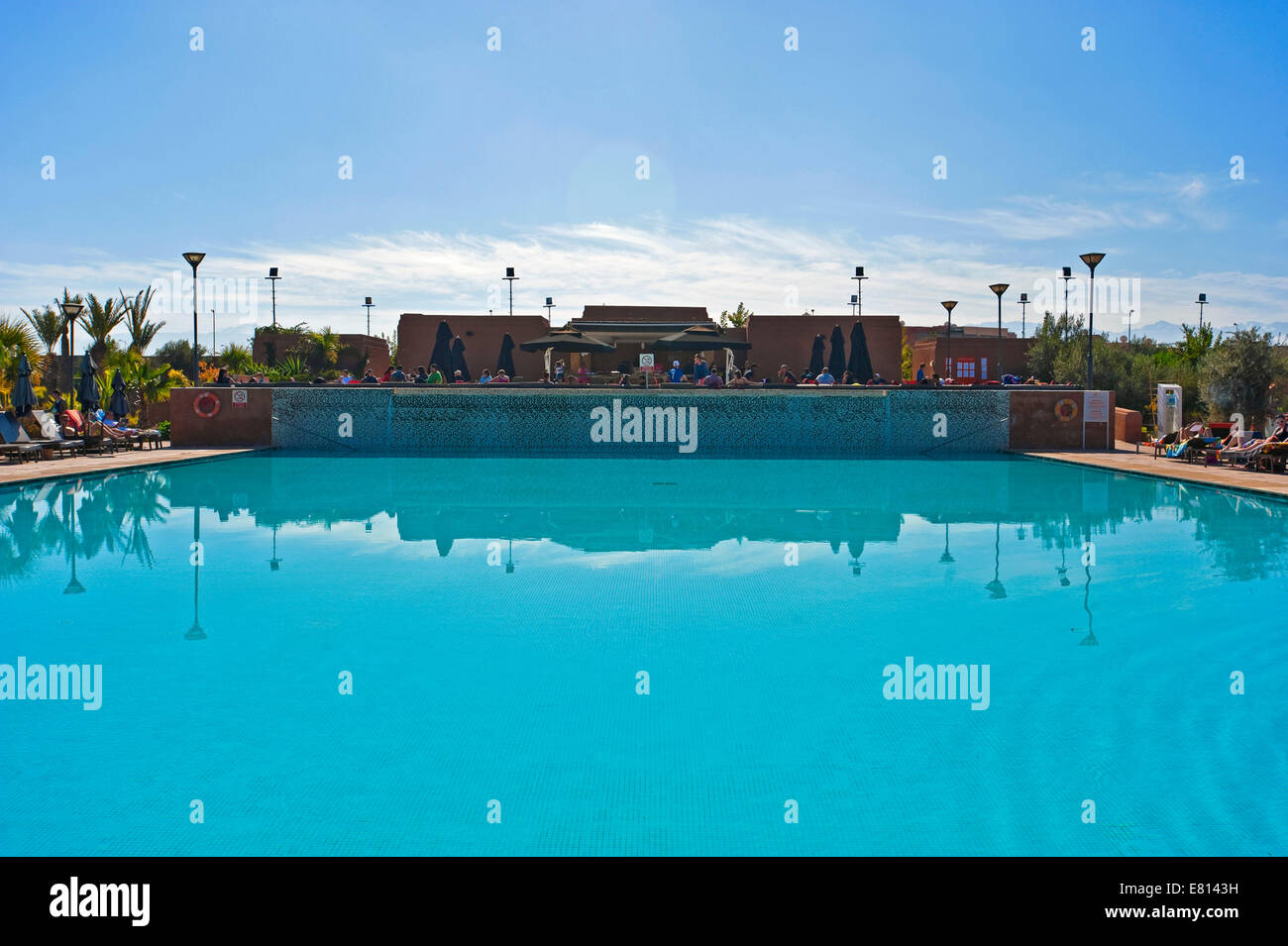 Horizontal view of an empty swimming pool at a plush hotel. Stock Photo
