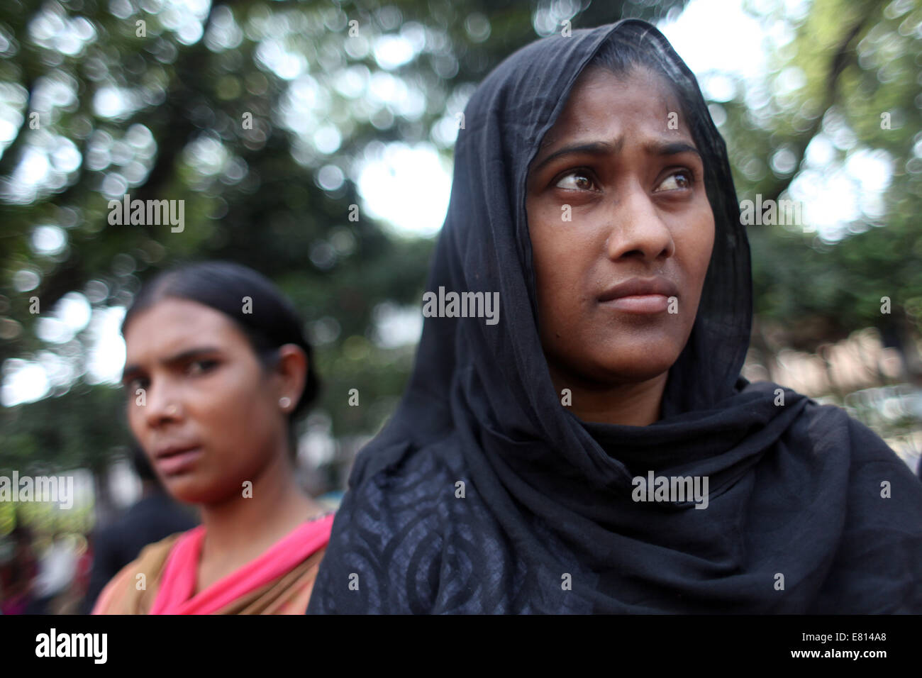 Dhaka, Bangladesh. 28th Sep, 2014. Garment workers take part in a protest in front of the press club demanding salary and Eid bonus before Eid. Credit:  Zakir Hossain Chowdhury/ZUMA Wire/Alamy Live News Stock Photo