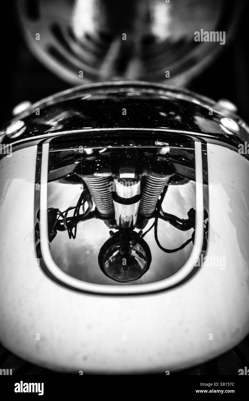 The reflection of the front of a motorbike in its front mudguard Stock Photo