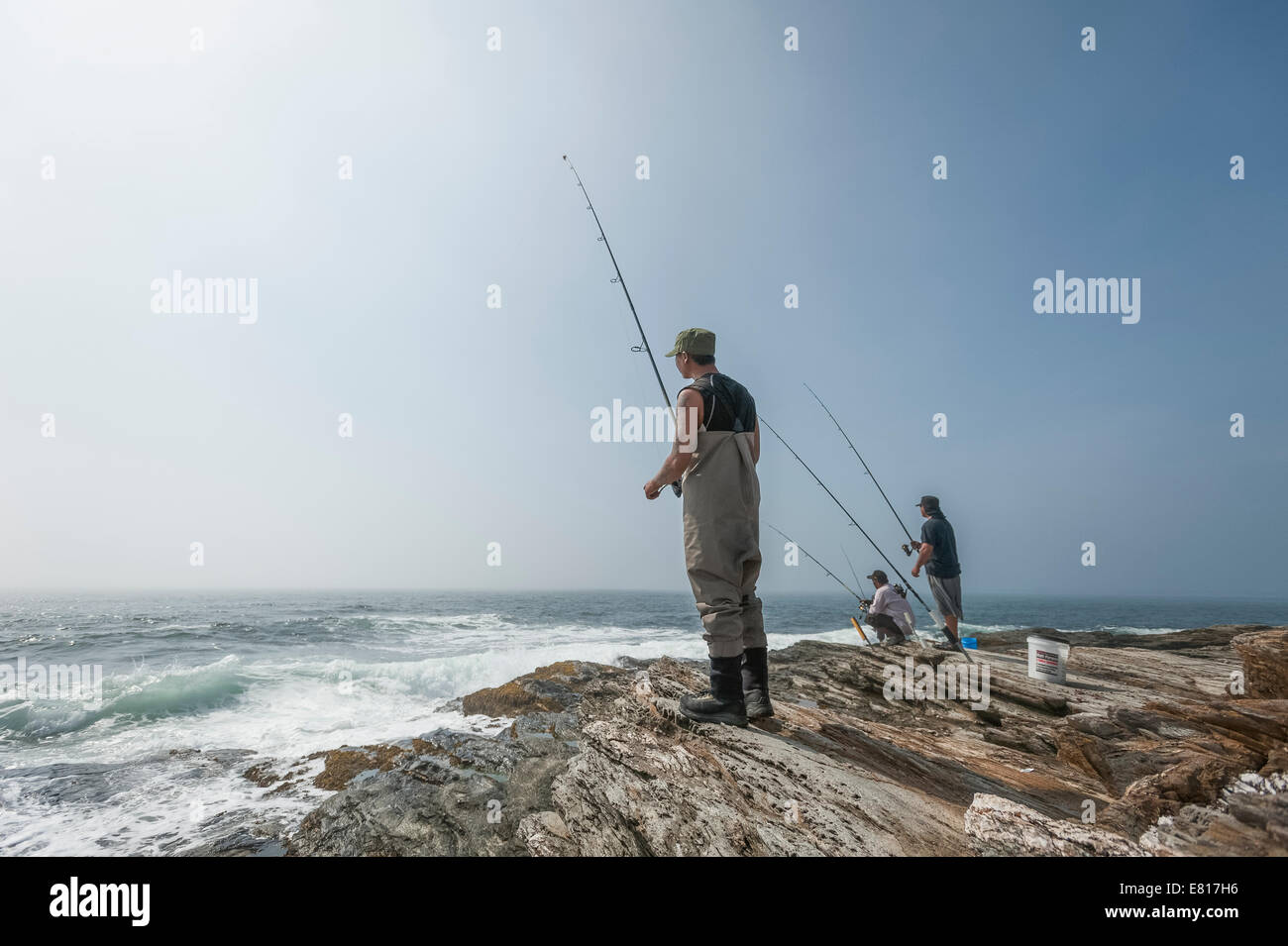Men onshore Ocean fishing on the shores of Point Judith, Rhode Island