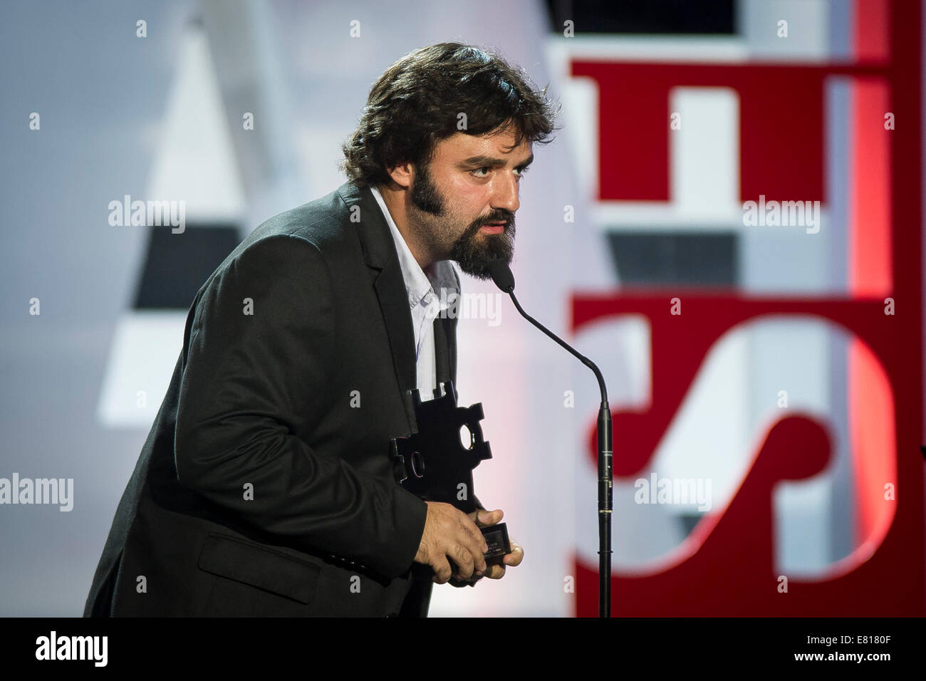 Director Petar Valchanov receives the Kutxa award 'New Best Director' by the film: 'The Lesson' during the closing ceremony of 62nd San Sebastian Film Festival in San Sebastian, Spain on 27 September of 2014/picture alliance Stock Photo