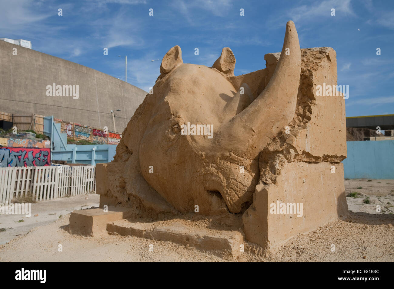 Rhino is one of the big five animals on display at the Sand Sculpture festival in Brighton Stock Photo