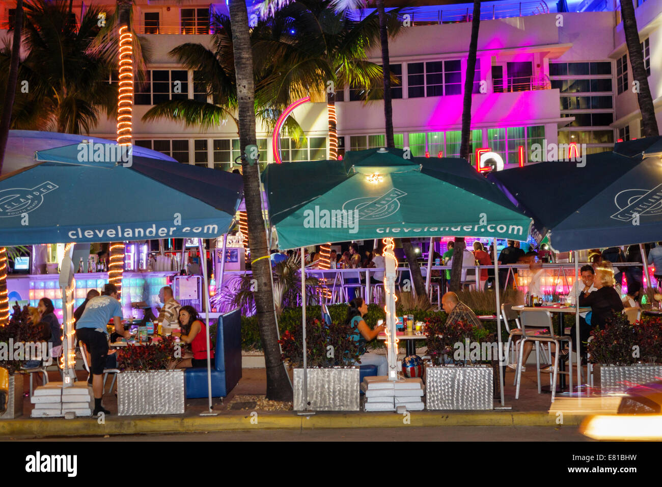 Miami Beach Florida,South Beach,Ocean Drive,night evening,Clevelander,club,restaurant restaurants food dining cafe cafes,al fresco sidewalk outside ta Stock Photo