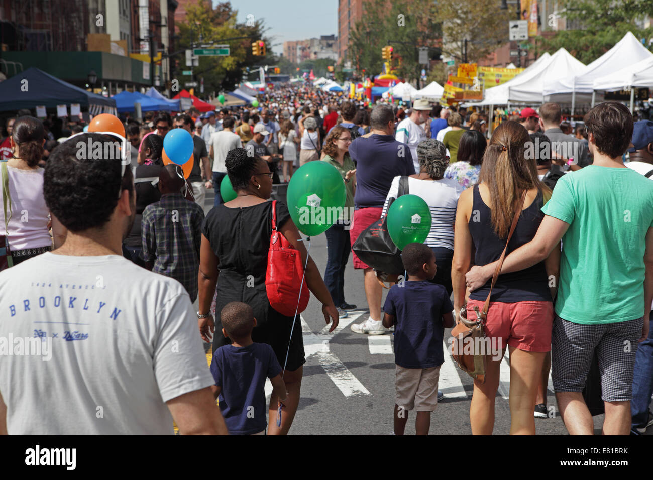 View of people walking along Atlantic Antic Street Fair which is held annually on Atlantic Avenue in Brooklyn Stock Photo