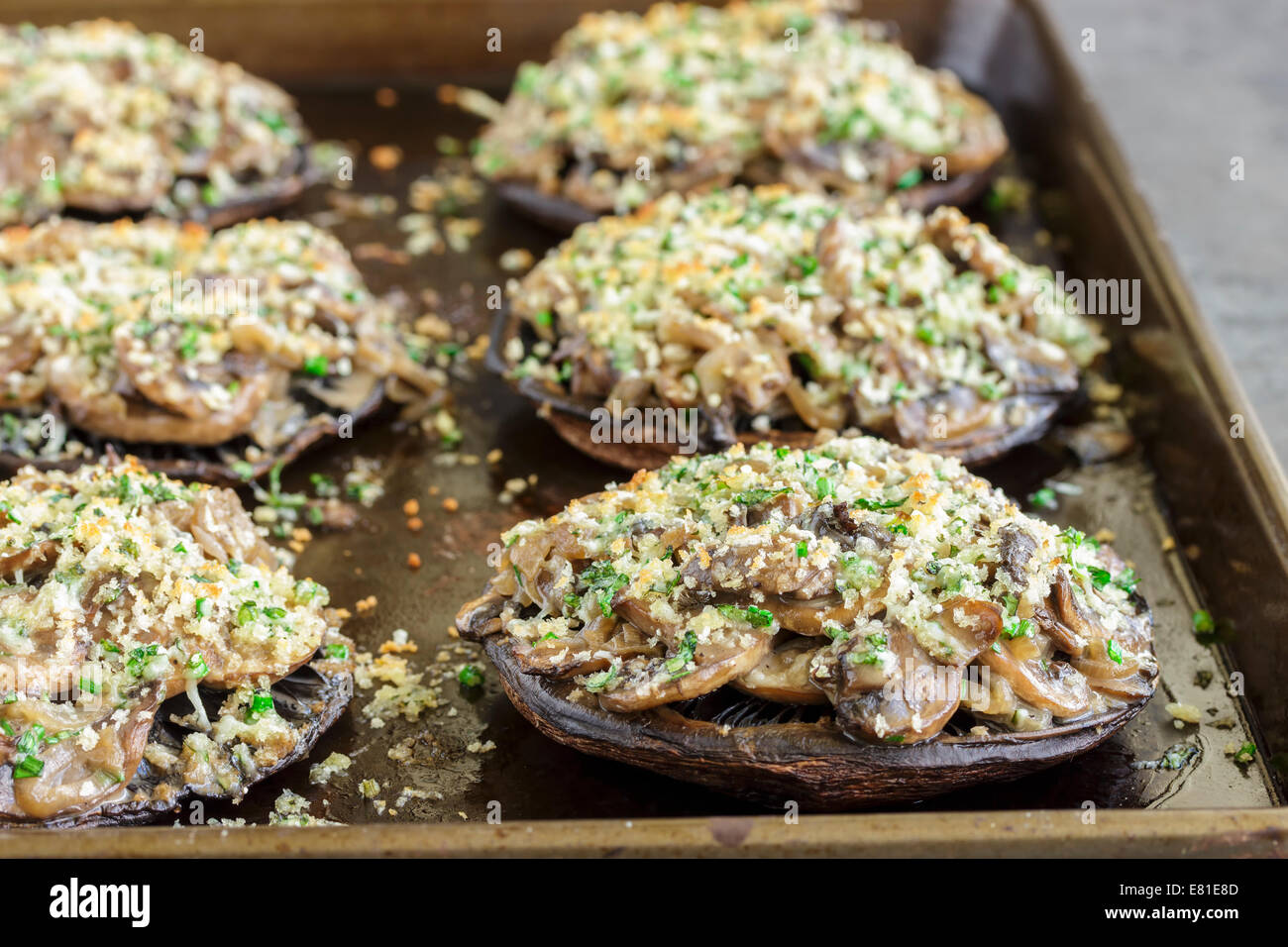 Portobello mushroom filled with shallots and cremini mushroom in a