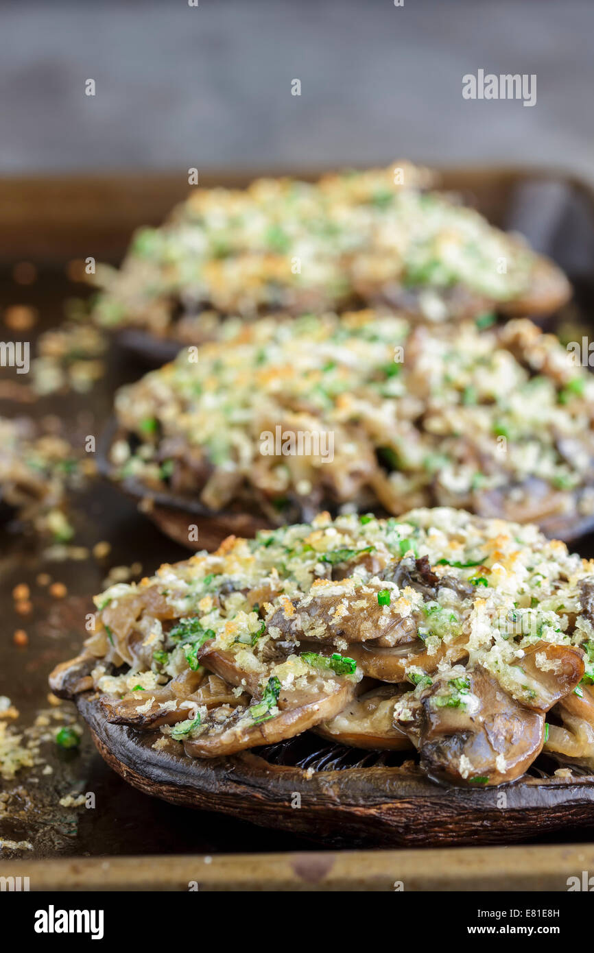 Portobello mushroom filled with shallots and cremini mushroom in a