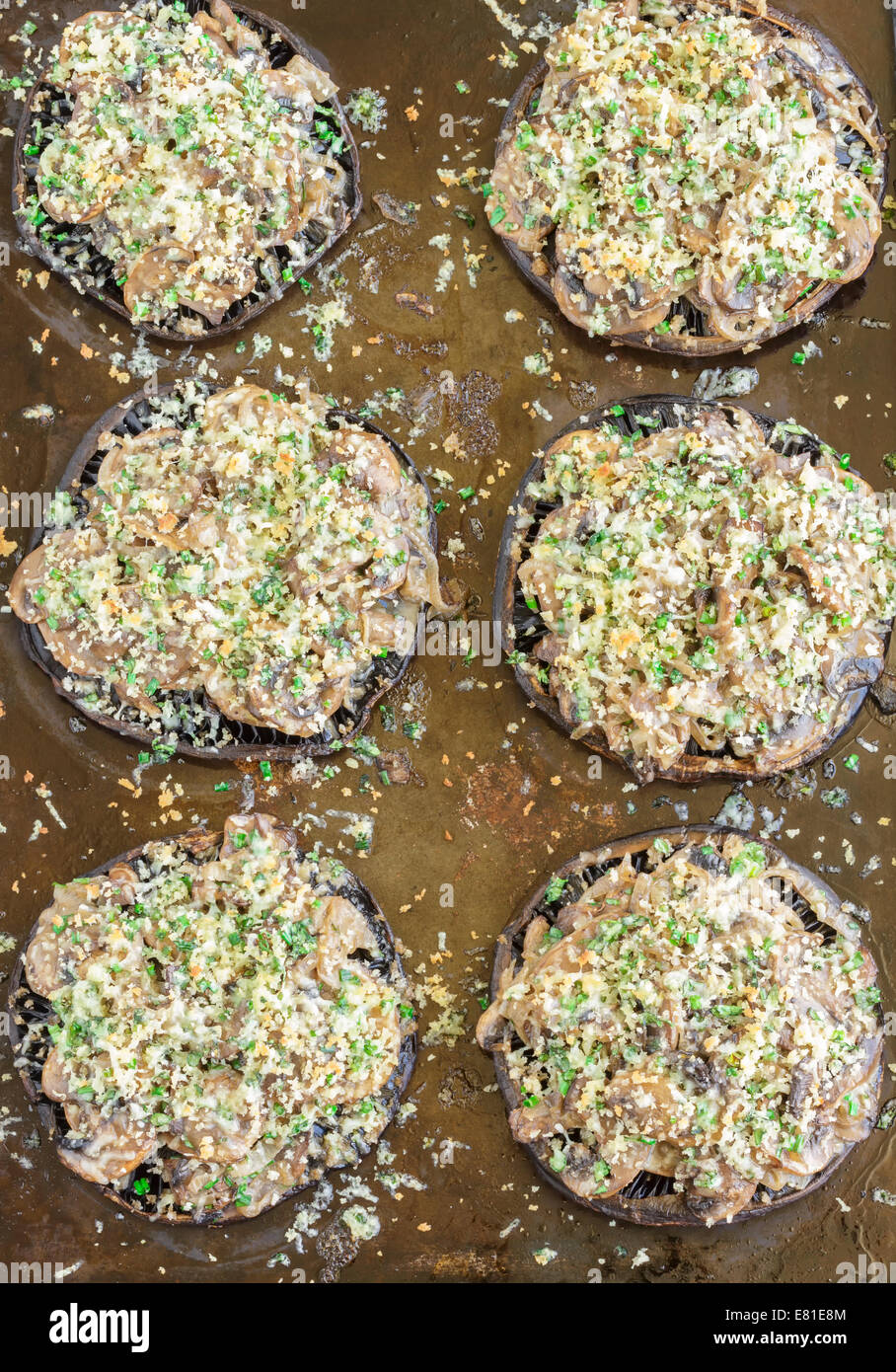 Portobello mushroom filled with shallots and cremini mushroom in a