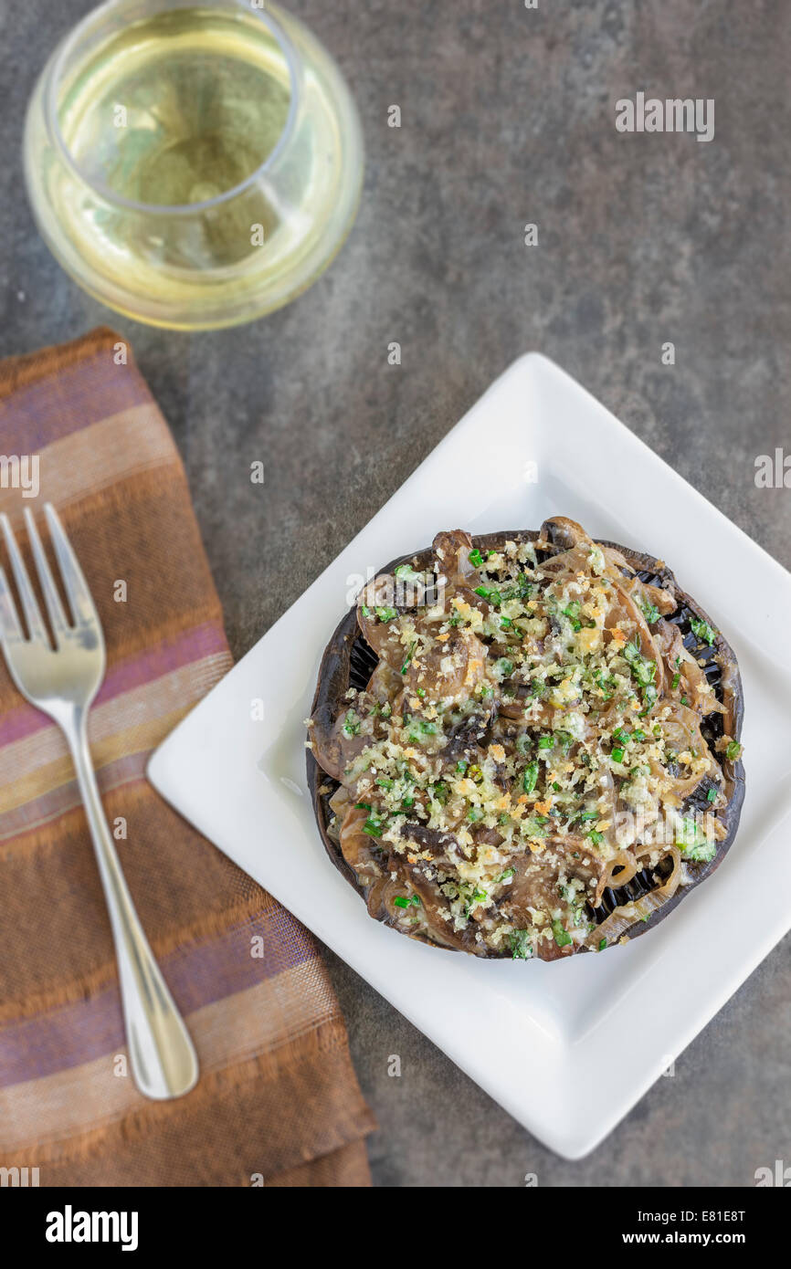 Portobello mushroom caps filled with shallots and cremini mushroom in a