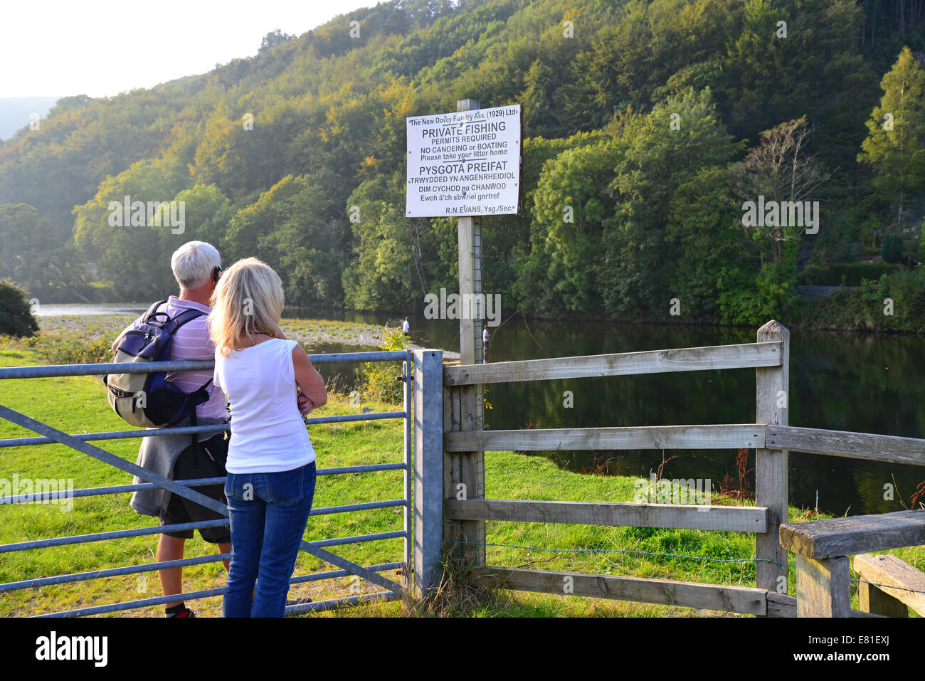 Couple by River Dovey, Snowdonia National Park, Gwynedd, Wales, United Kingdom Stock Photo
