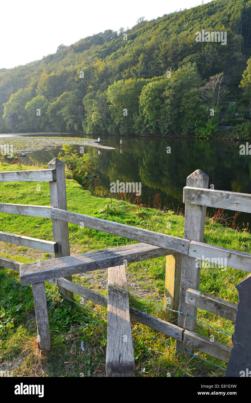 Wooden fence stile by River Dovey. Snowdonia National Park, Gwynedd, Wales, United Kingdom Stock Photo
