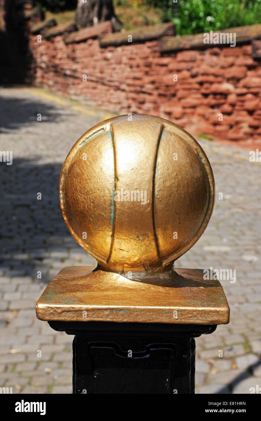 Ornamental gold ball on top of a wrought iron fence post, Chester, Cheshire, England, UK, Western Europe. Stock Photo