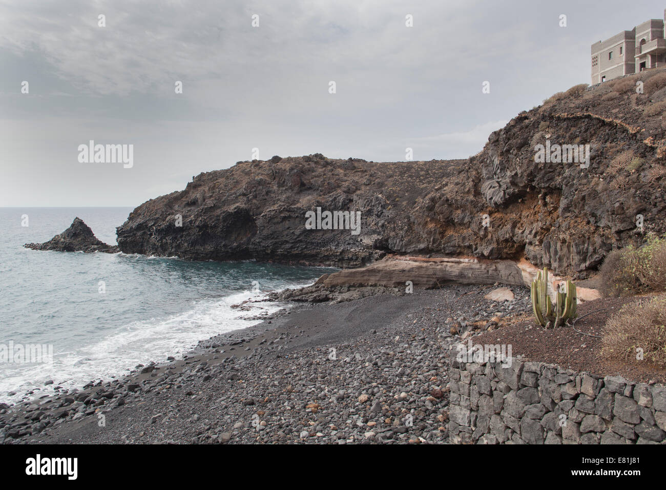 Canary Islands Tenerife rocky beach waves break Stock Photo