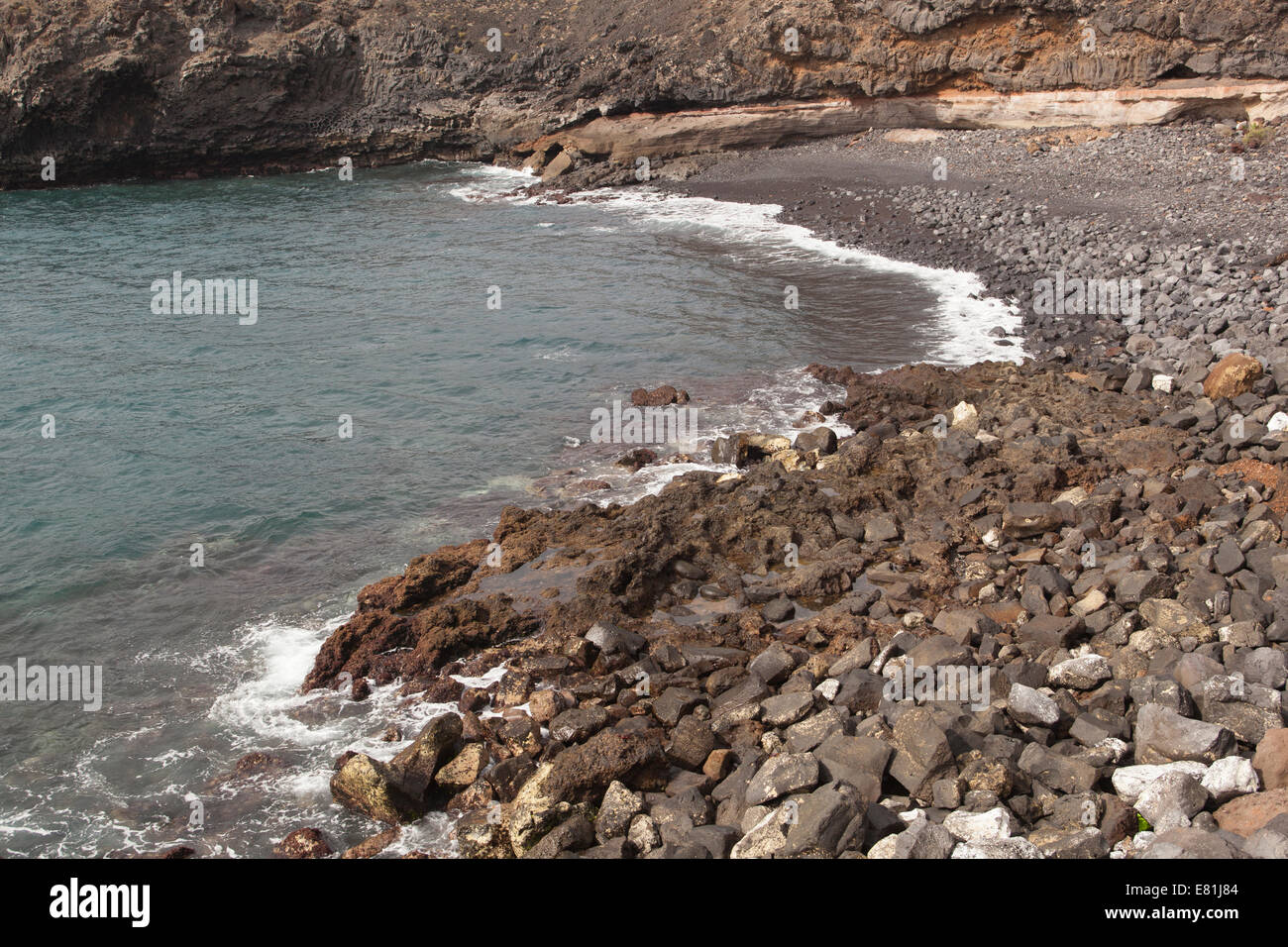 Canary Islands Tenerife rocky beach waves break Stock Photo