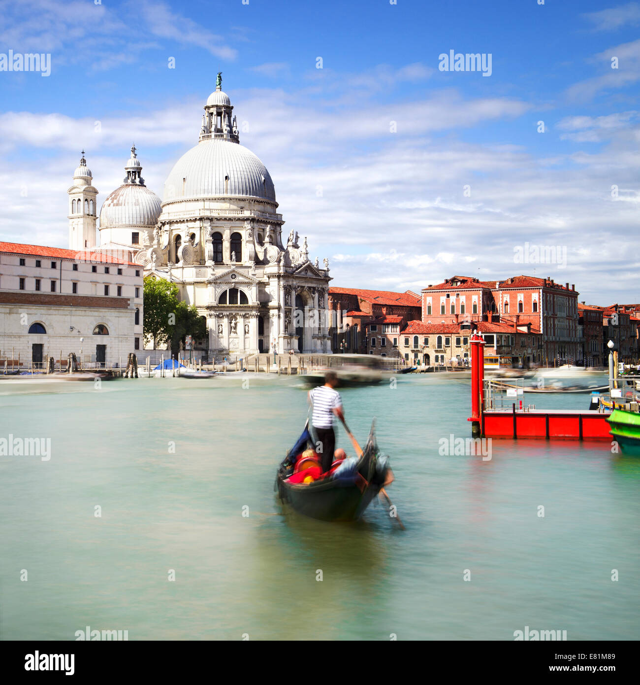 Gondola on Canal Grande with Basilica di Santa Maria della Salute in the background, Venice, Italy Stock Photo