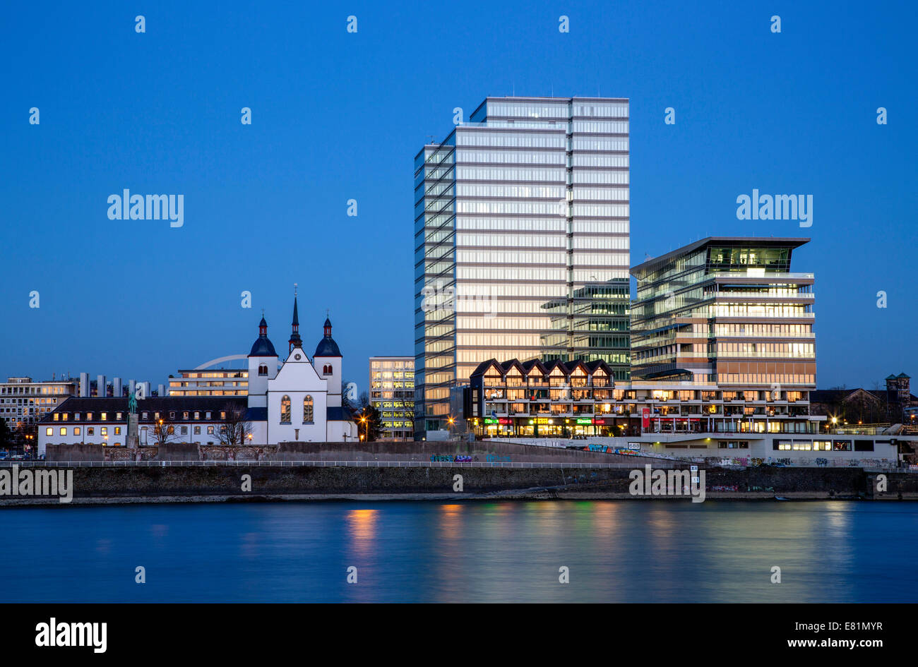 The former Lufthansa high-rise building and Deutz Abbey, former St. Heribert monastery, on the east bank of the Rhine in Deutz Stock Photo