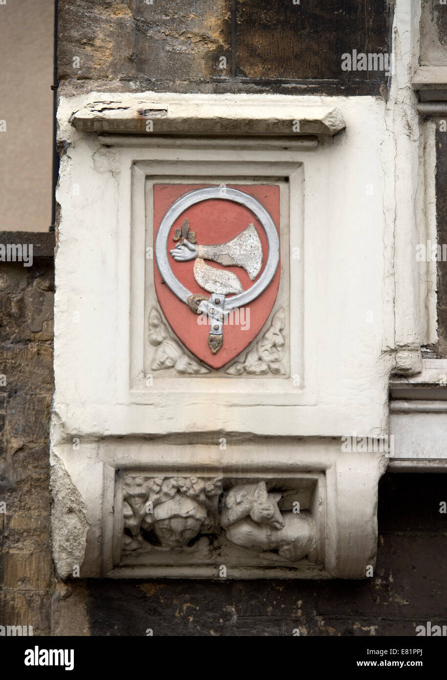 The Somerset village of Bruton - historic coat of arms detail in the High Street. Stock Photo