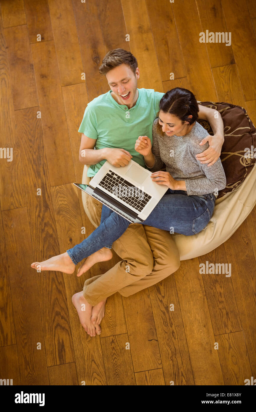 Man woman sitting on beanbag hi-res stock photography and images - Alamy