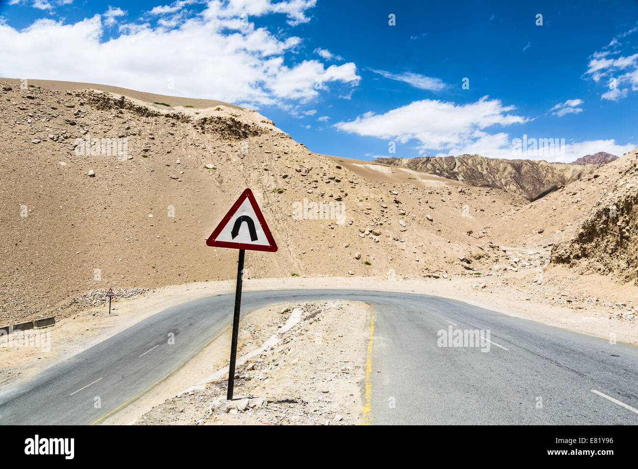 Sharp curve on the road in Ladakh, India Stock Photo