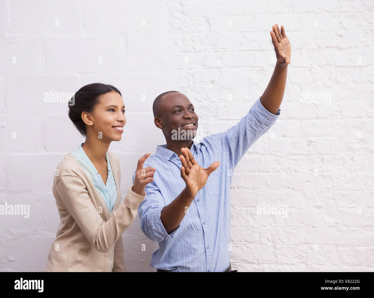 Businessman explains something to his colleague Stock Photo
