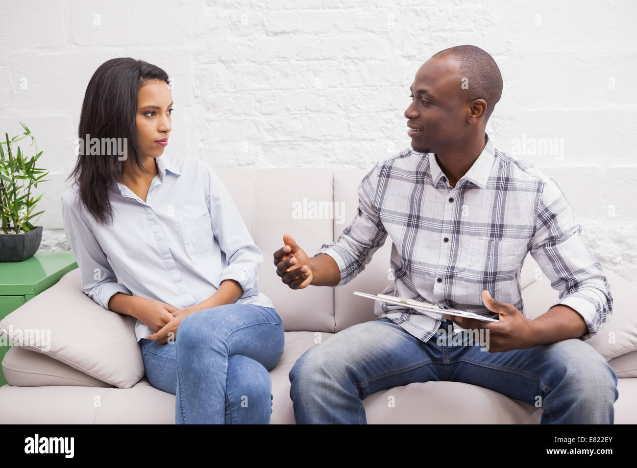 Therapist talking to his patient Stock Photo