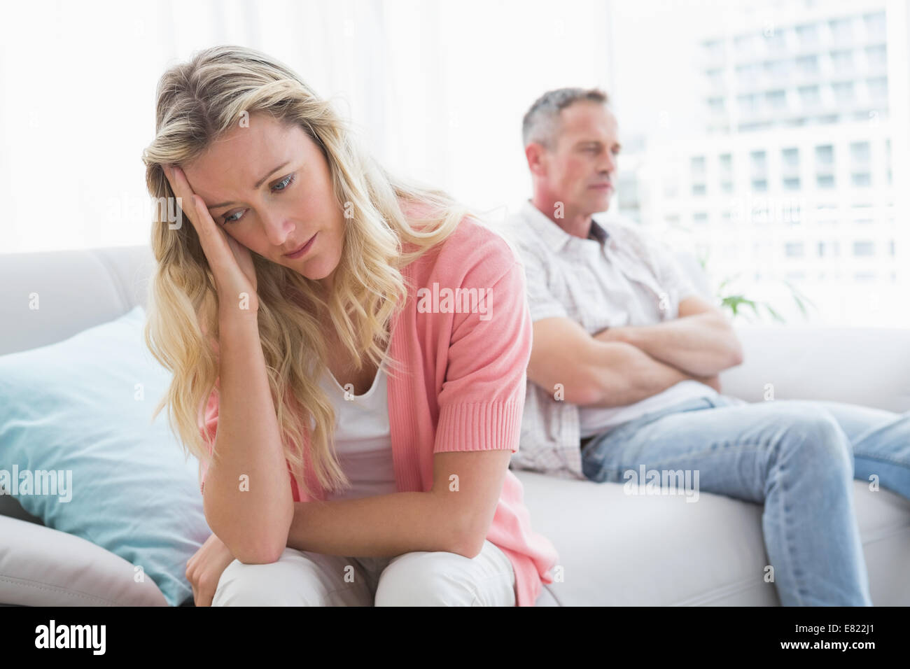 Unhappy couple are stern and having troubles Stock Photo