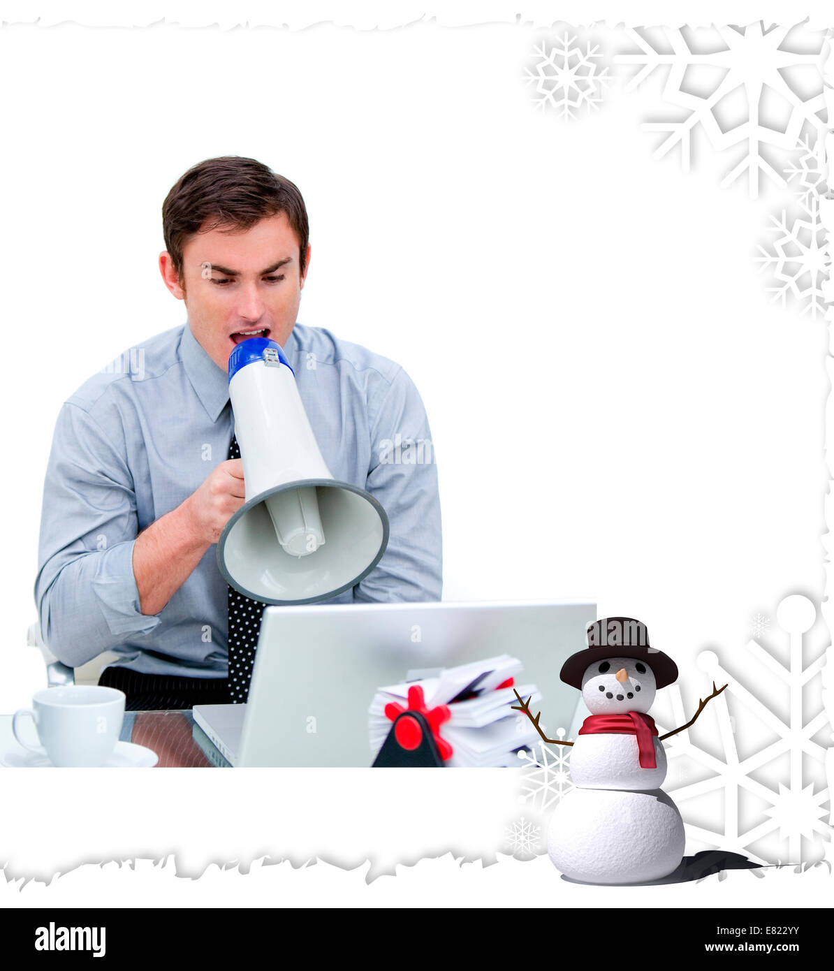 Angry businessman yelling through a megaphone Stock Photo