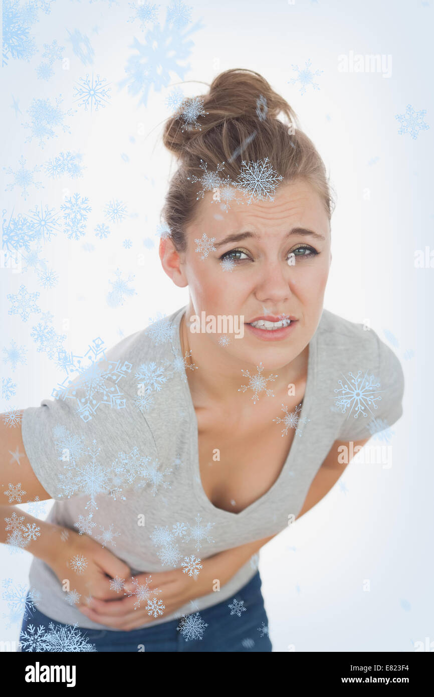 Young woman suffering from stomach pain Stock Photo Alamy