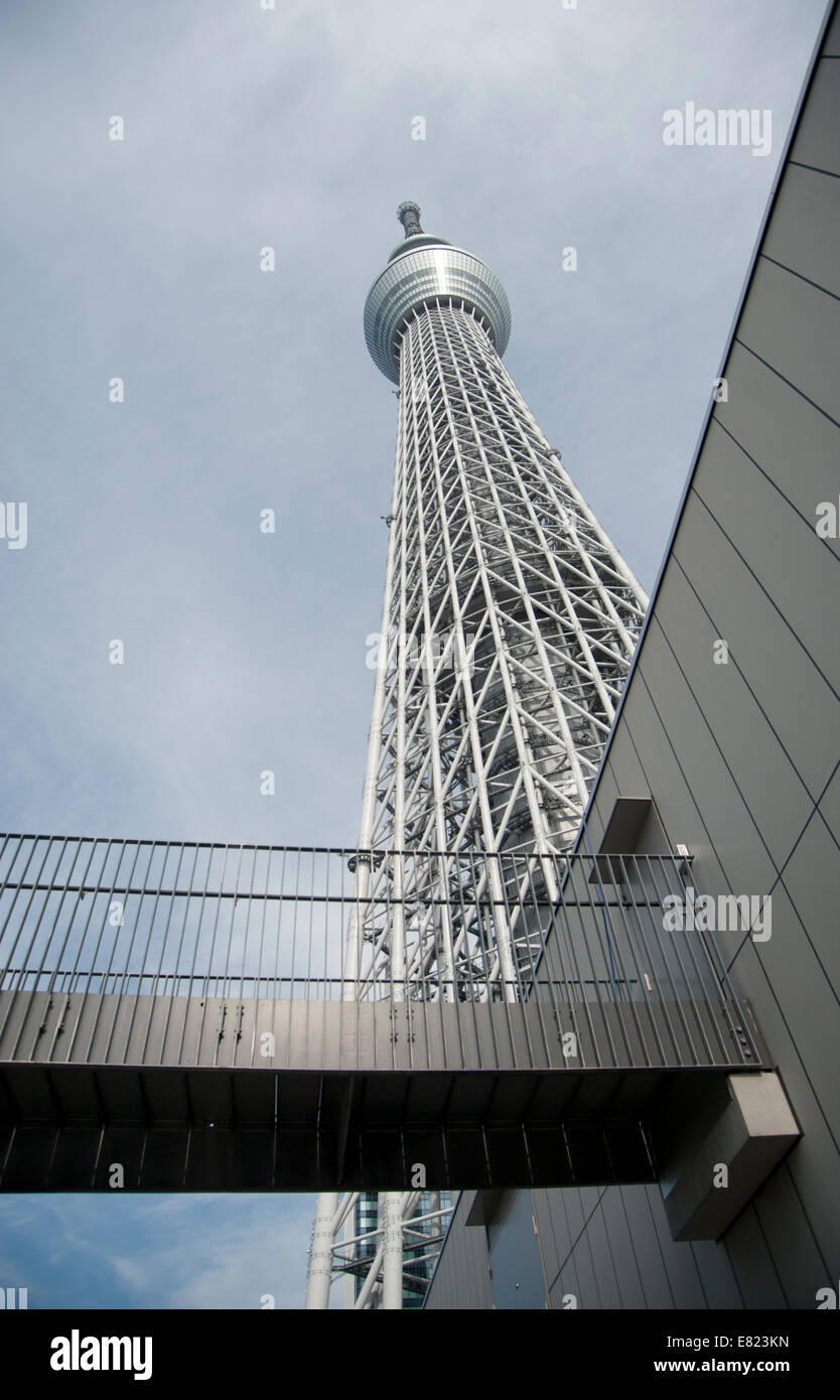 Tokyo Skytree and walkway seen from below. This is the world's tallest tower at 634 meters. It is a television broadcasting and observation tower. Stock Photo