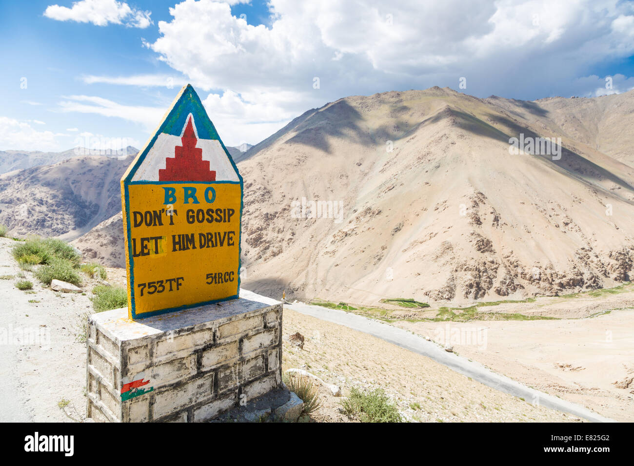 'Don't gossip, let him drive' sign on the road in Ladakh, India Stock Photo
