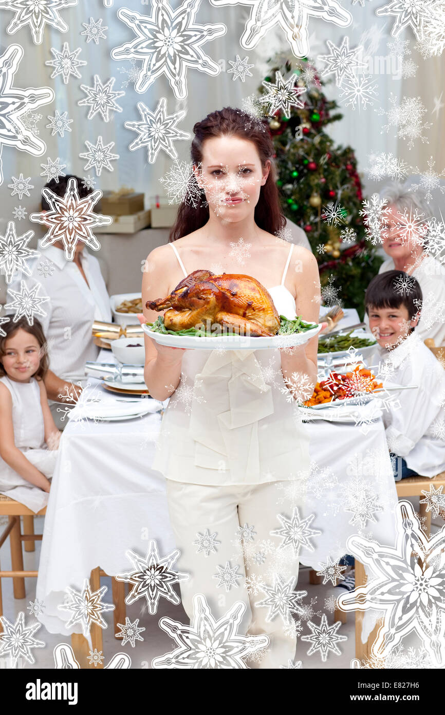 Mother showing turkey for christmas dinner Stock Photo Alamy