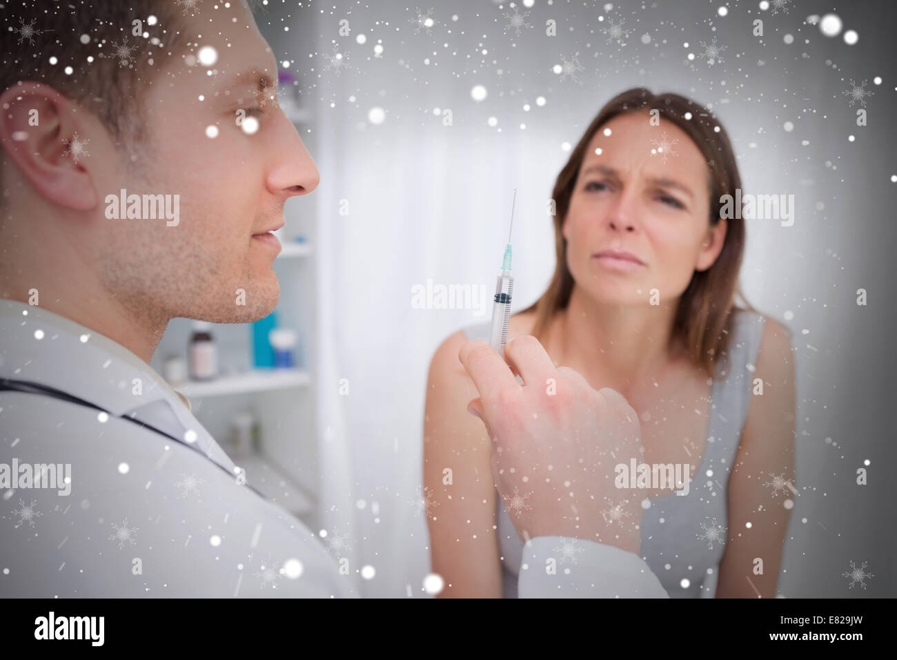 Composite image of doctor preparing injection Stock Photo - Alamy